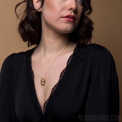 Young woman wearing 14kt yellow gold SodaTab necklace